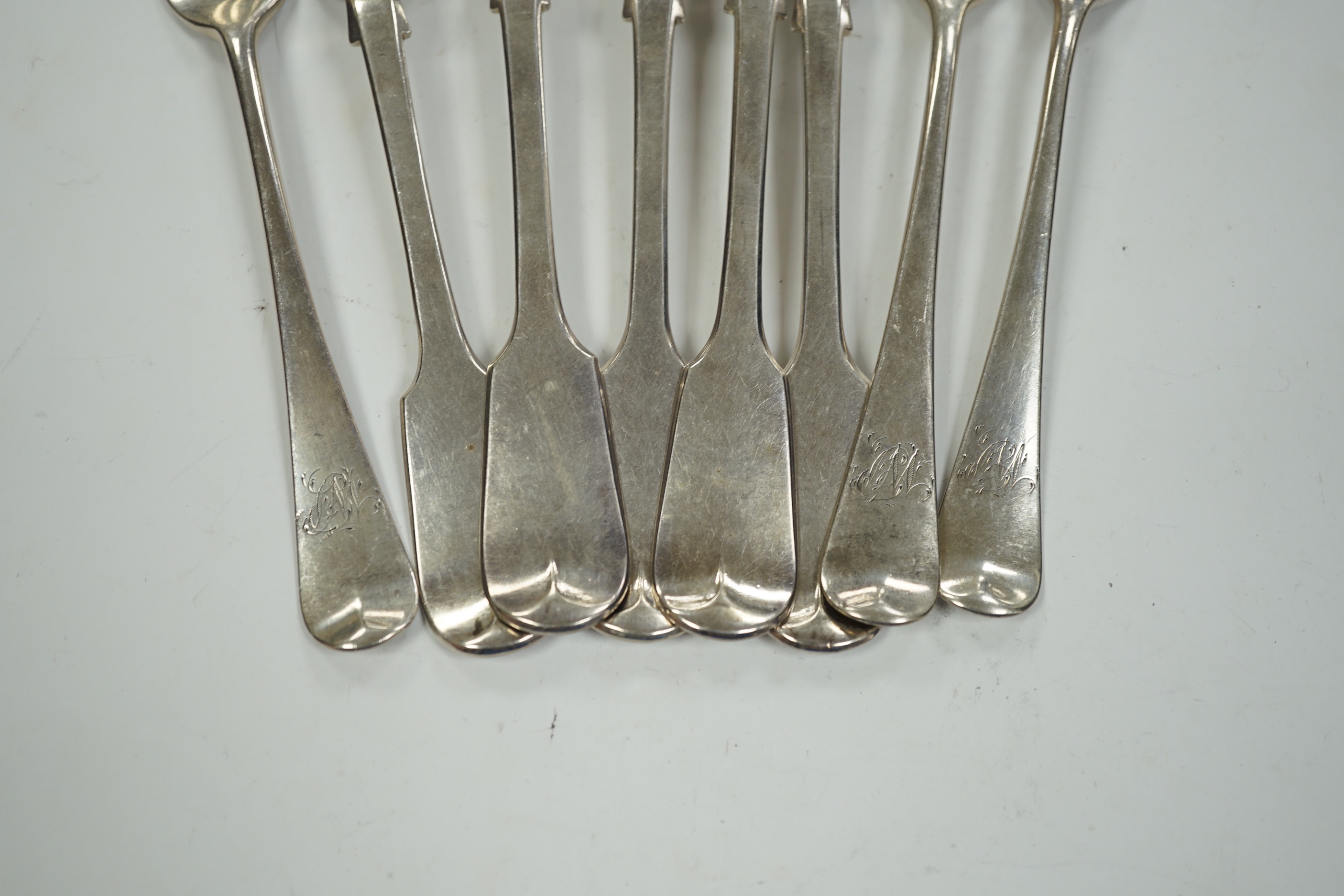 Five Victorian silver fiddle pattern dessert forks, London, 1854 and three George III silver dessert forks, 10.9oz.